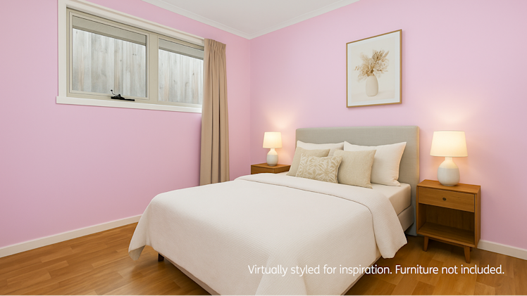 Charming bedroom with soft pink walls, beige curtains, minimalist decor, and a neutral-toned bed with warm lighting.