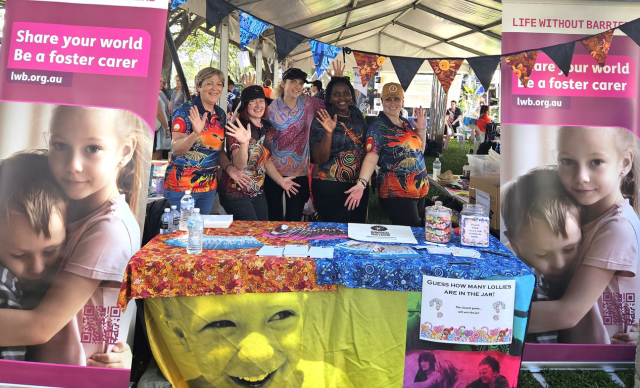 A group of staff at the Life Without Barriers stall.