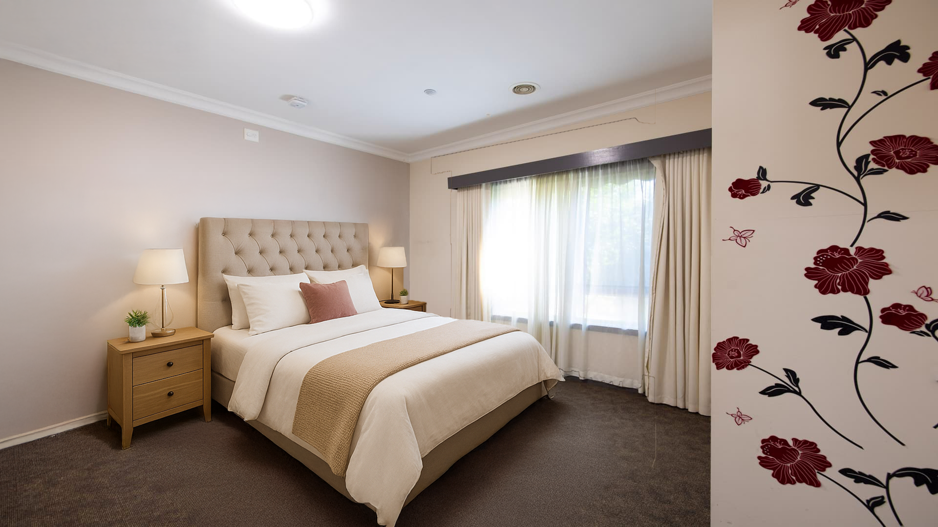 Grey carpeted vacant bedroom with large curtained window, grey carpet and heating plus cooling.