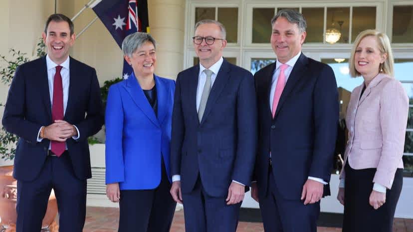 Jim Chalmers, Penny Wong, Anthony Albanese, Richard Marles and Katy Gallagher pose for a photograph outside Government House after being sworn in. Credit: Getty Images
