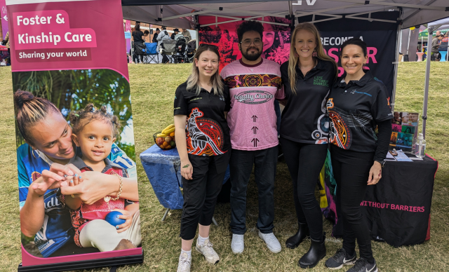 A group of staff at the Life Without Barriers stall.