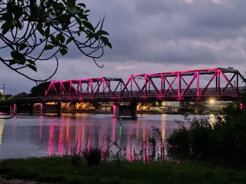 Macksville Bridge with pink lights.