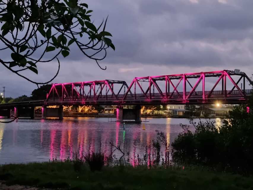 Macksville Bridge with pink lights.