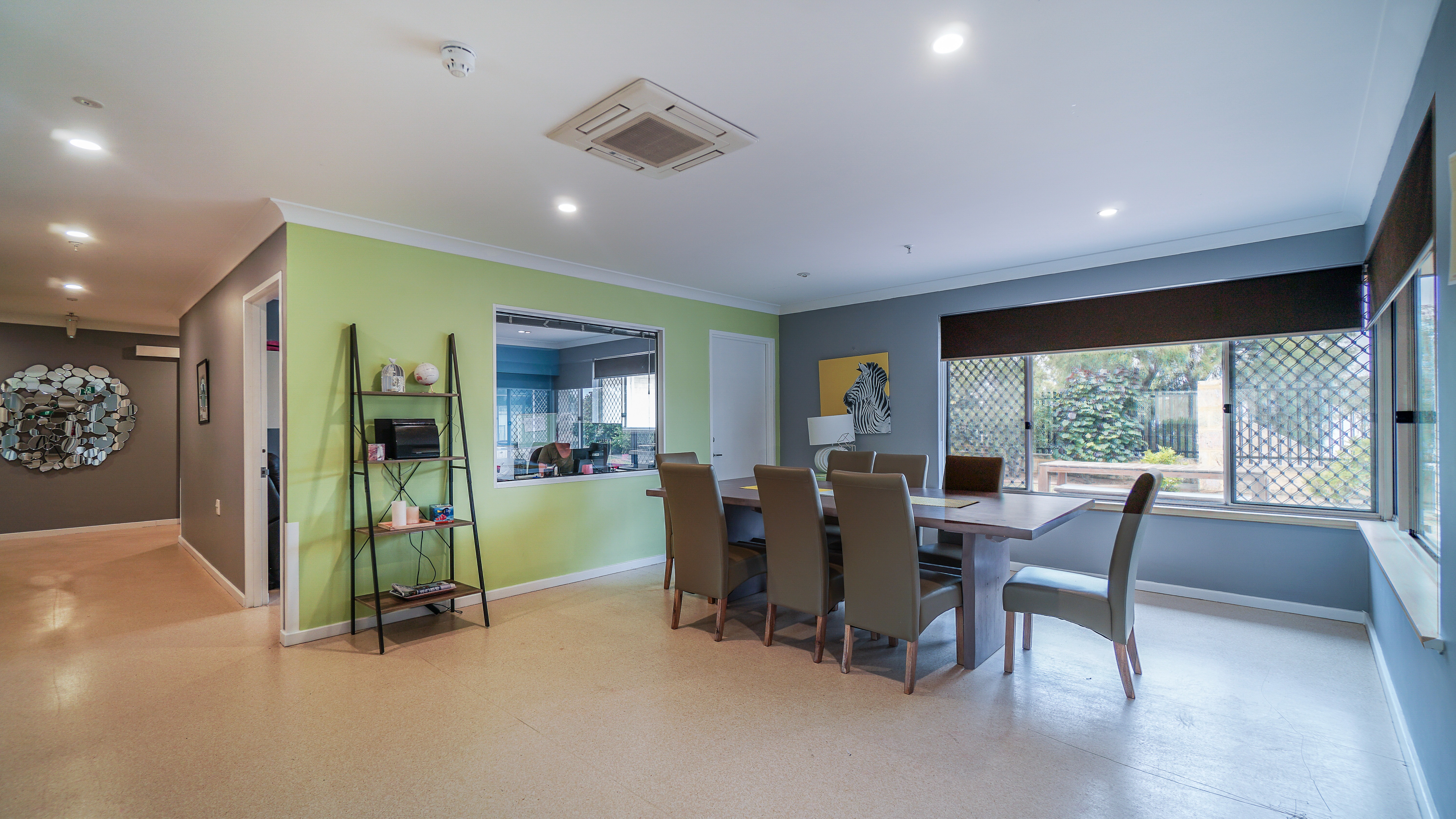 --Dining room with a dining table and 8 chairs.--