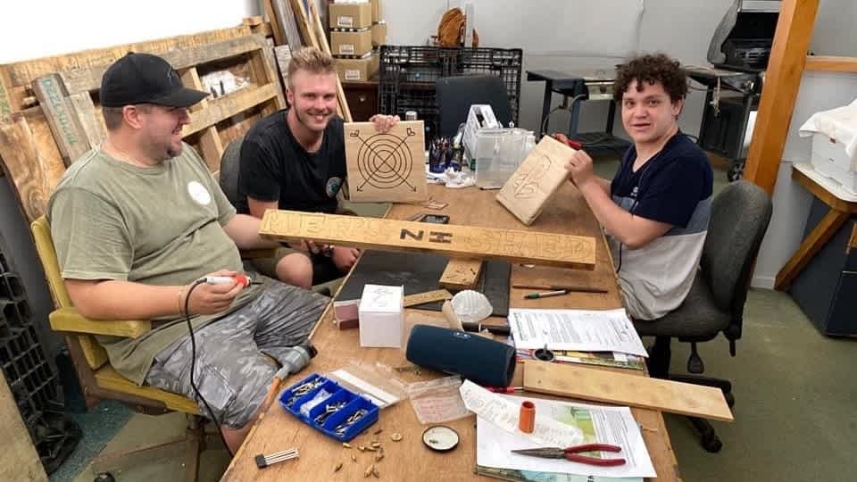 Chad, Lleyton and Jayden with their wood work projects.