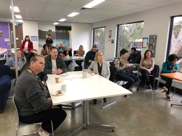 Staff gathered the Canterbury office, completing an activity. 