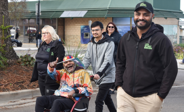 A group of people participating in the Ceduna NAIDOC March. 