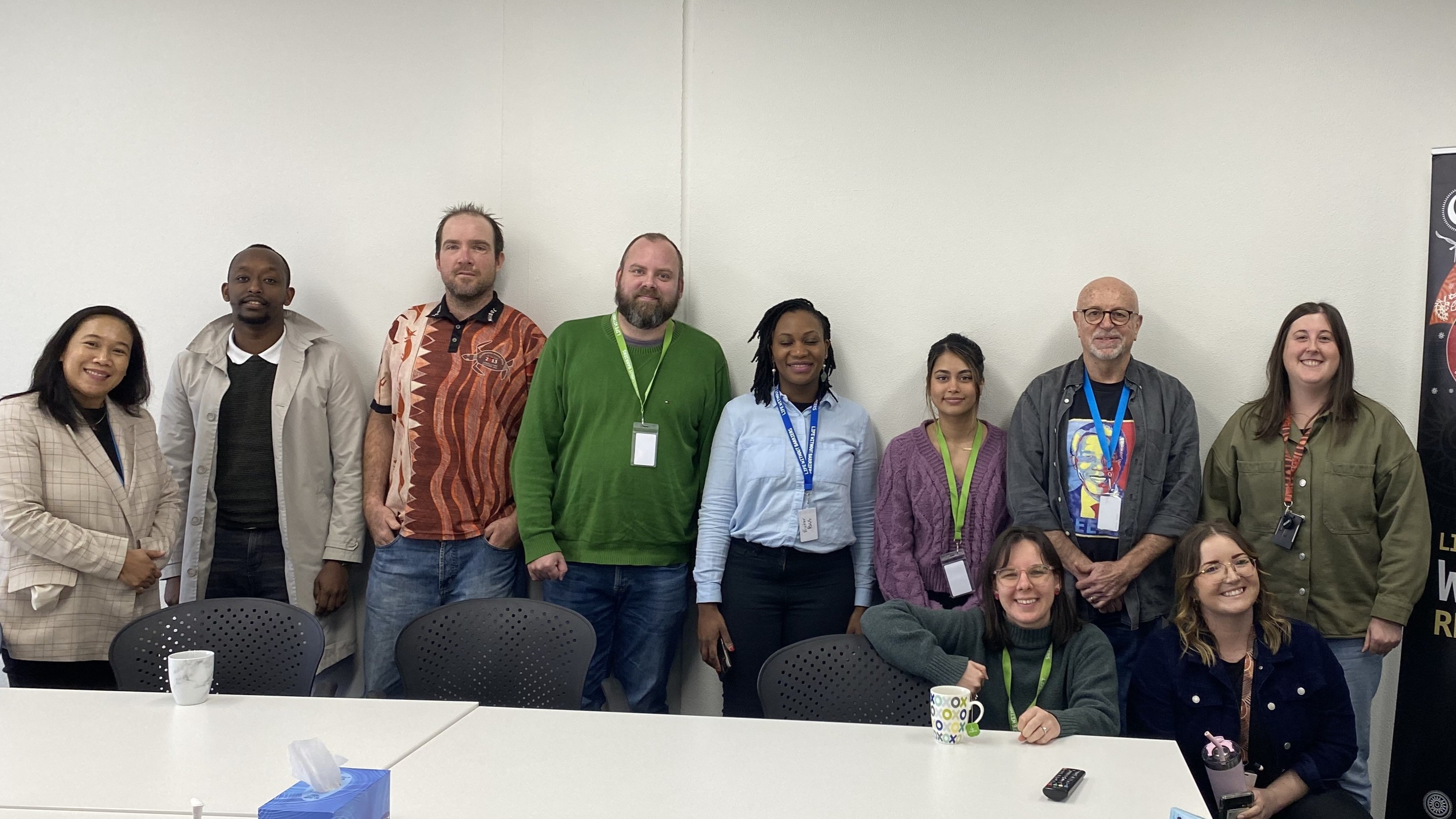 Staff gathered in a group at the Dandenong office.