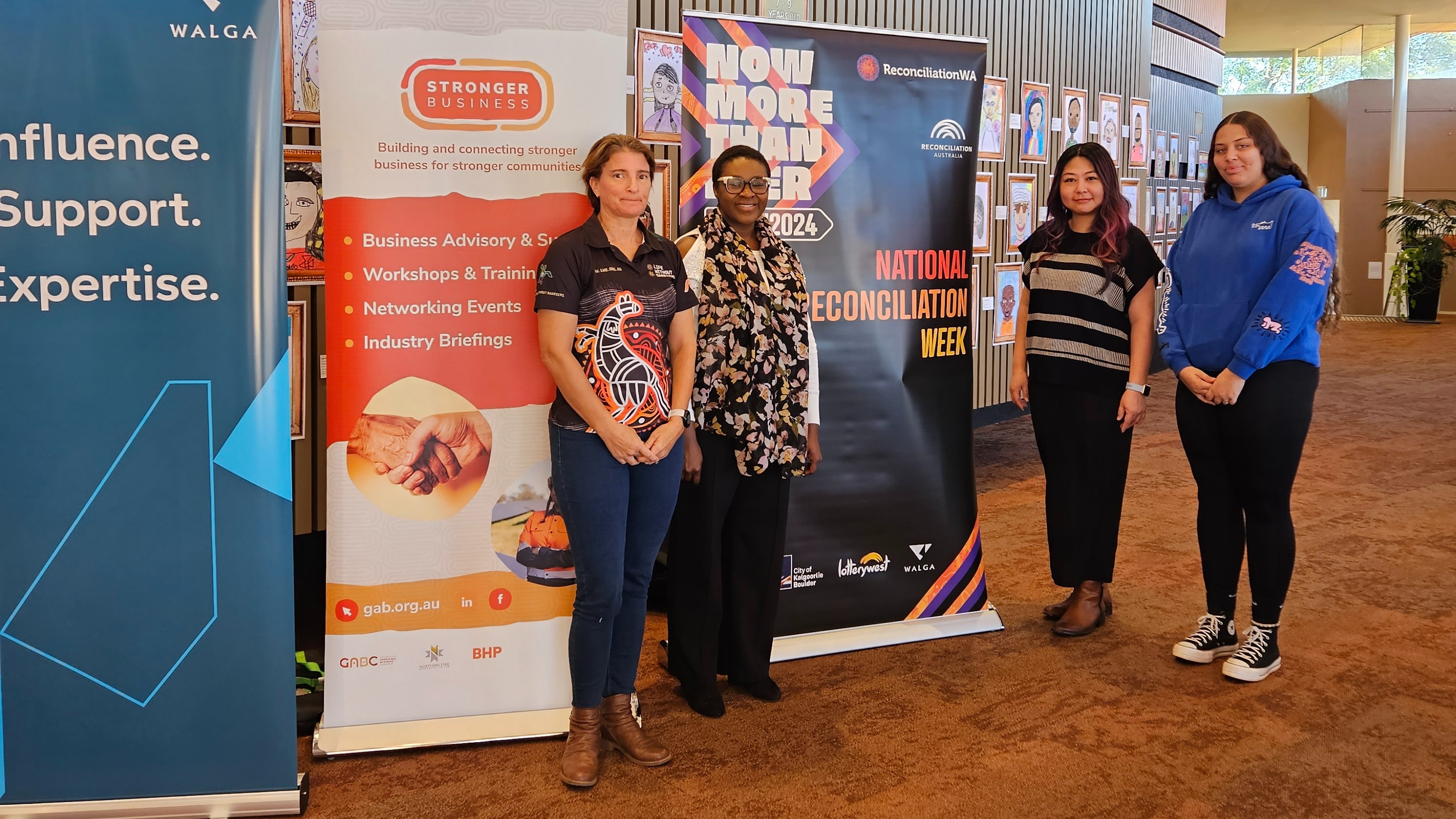 Four staff members at the National Reconciliation Week Breakfast in Kalgoorlie.