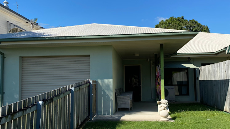 --Front of home with a green exterior--