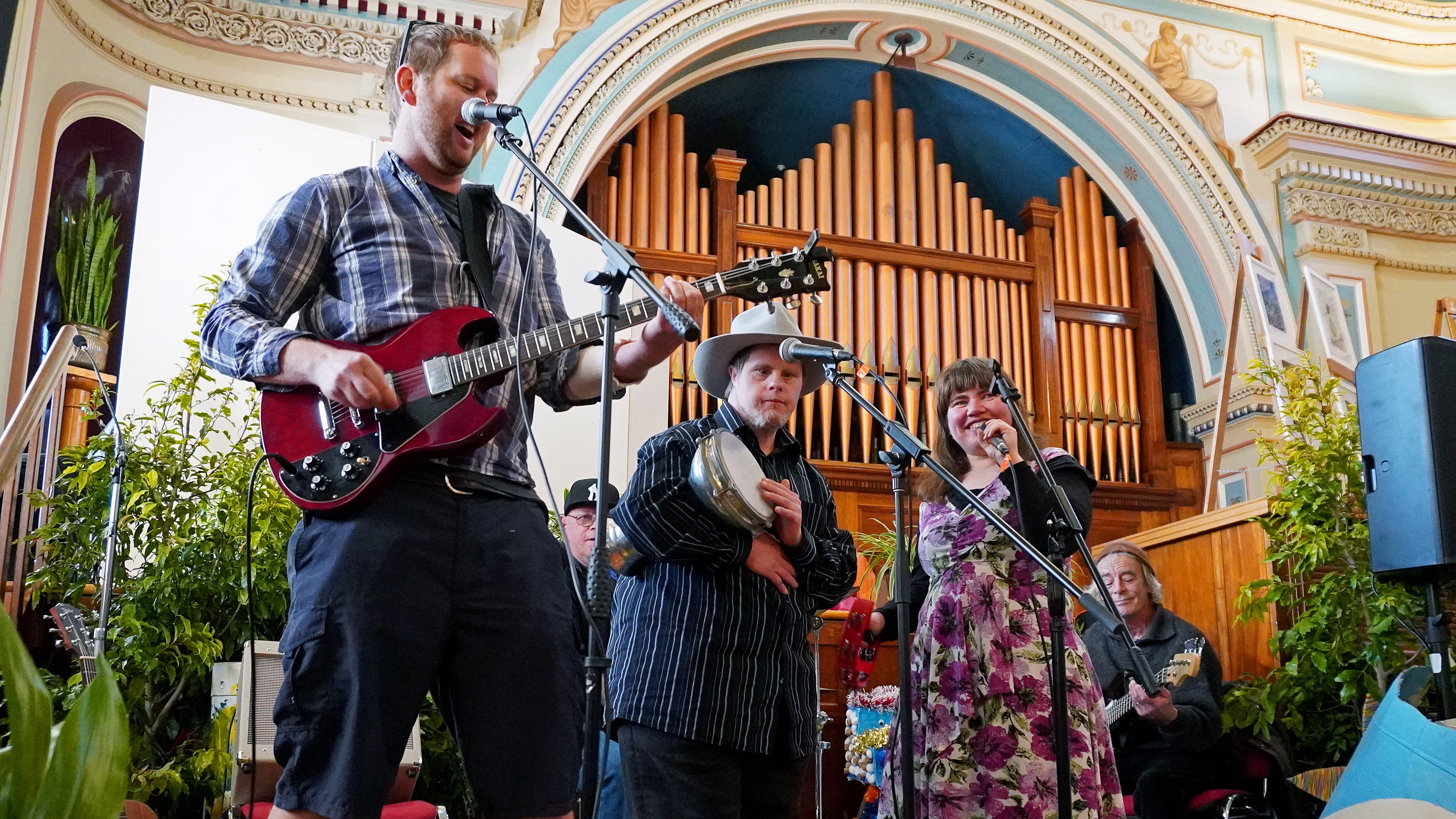 Sound Barriers band mates performing on stage.
