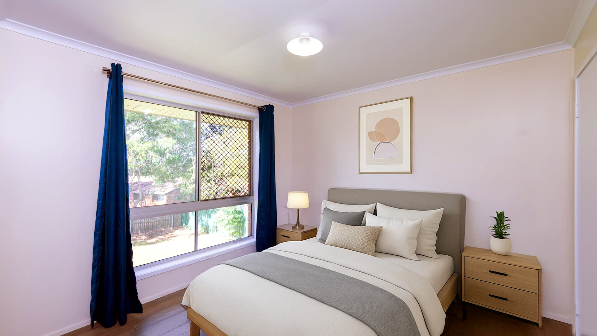 --Bedroom with built-in-wardrobe and large window with blue curtains.--