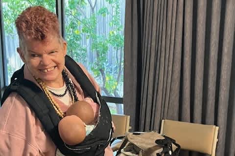 Dianne with her two dolls.