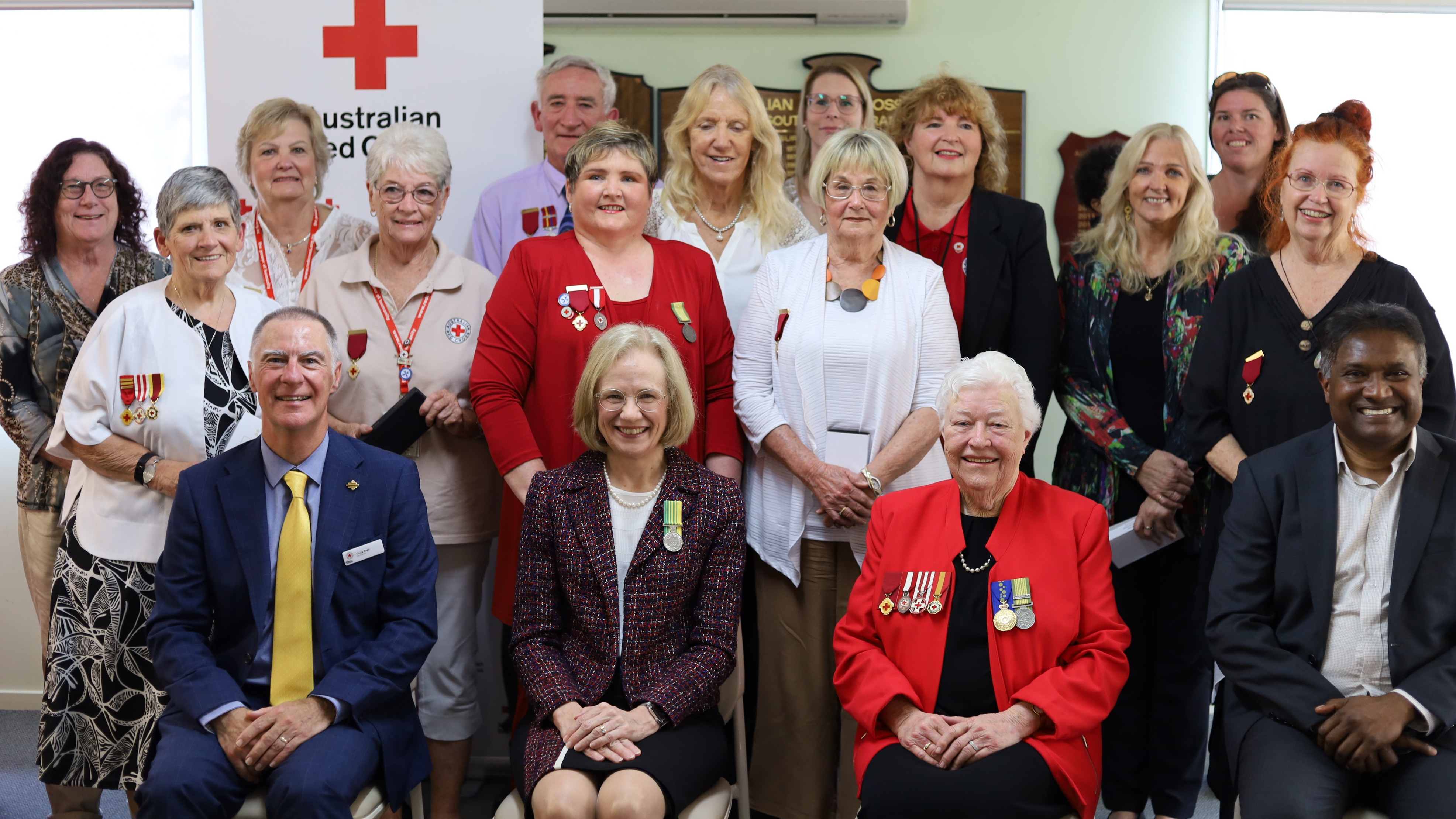 Group photo of all recipients of the National Emergency Medal by Governor-General.