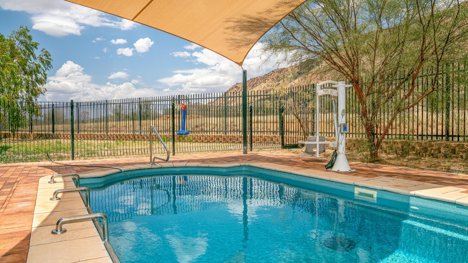 --Outdoor fully fenced pool.--