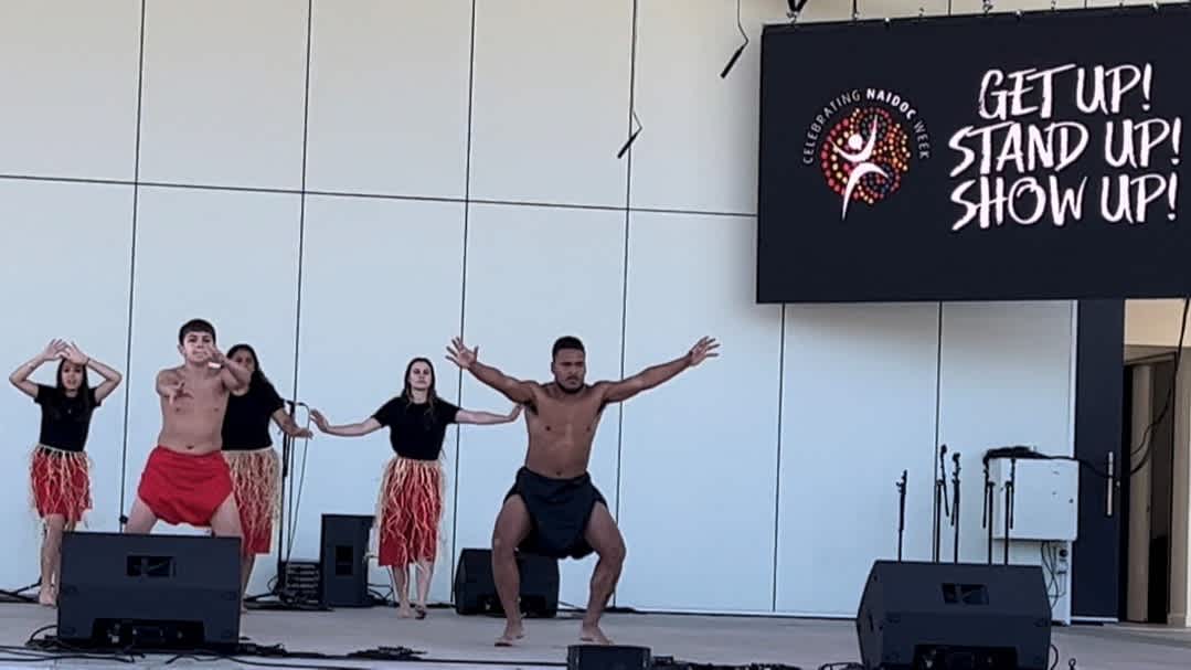 Aboriginal and Torres Strait Islander dancers performing at Logan NAIDOC event.