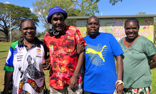 Warren with his family and community at the Danila Dilba Community Health and Family Day.