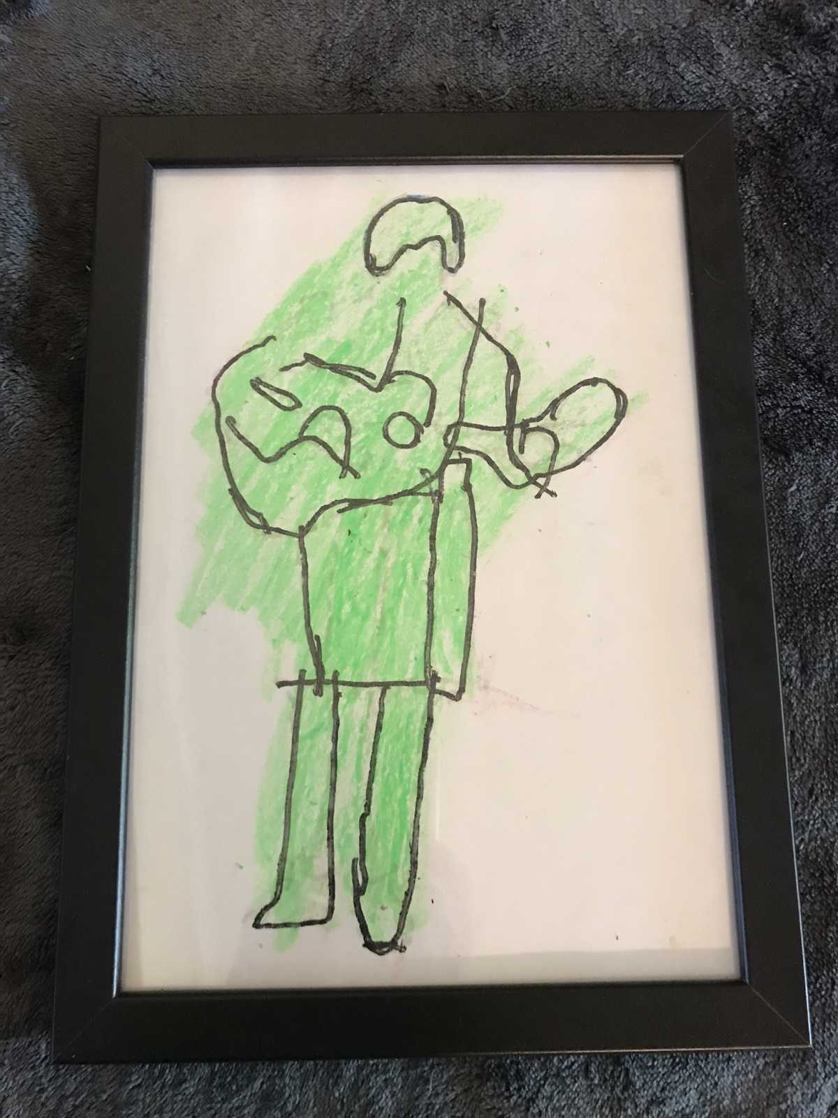 Emily's drawing of a member of the Beatles.