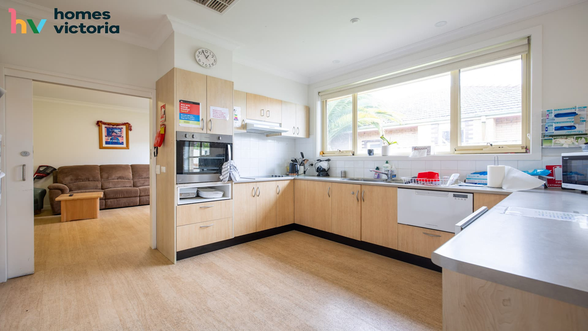 Open plan kitchen, with dishwasher drawer, oven sinks and stove top.