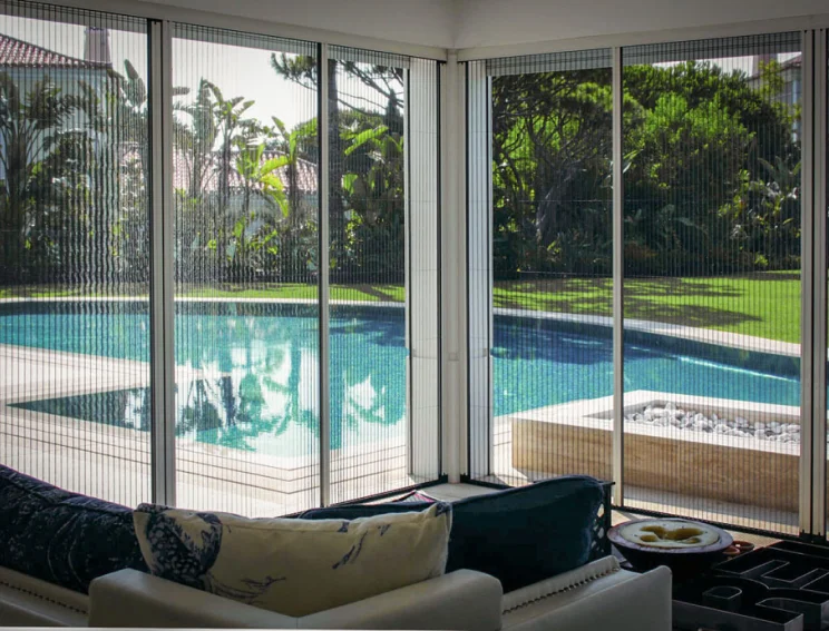 This is a photo of a house with insect screen doors.