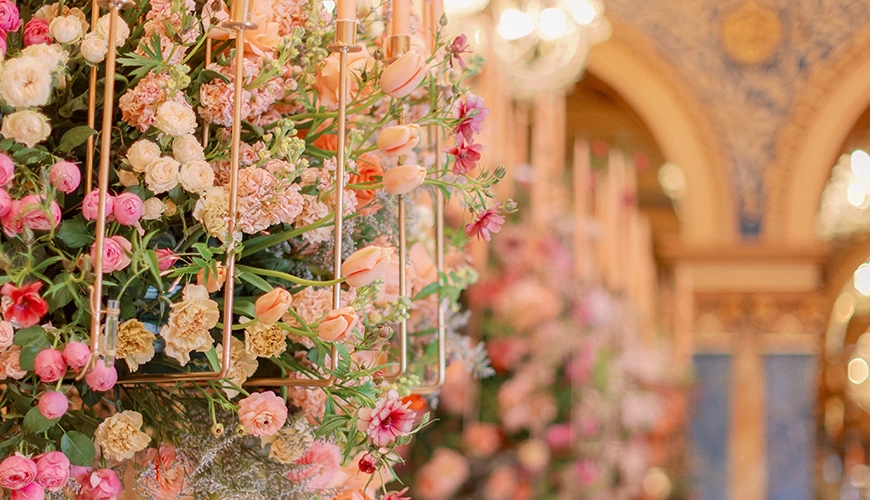 Pastel symphony wedding flowers chandelier
