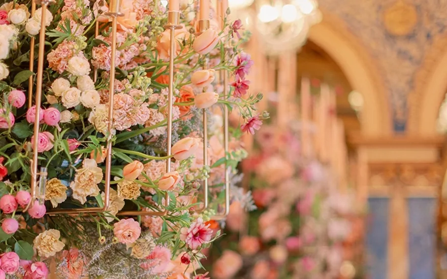 Pastel symphony wedding flowers chandelier