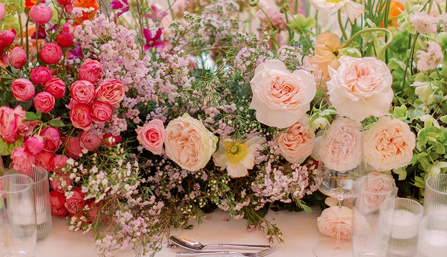 Pastel symphony wedding flowers table