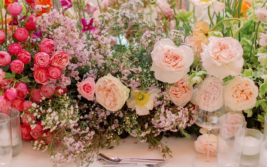 Pastel symphony wedding flowers table