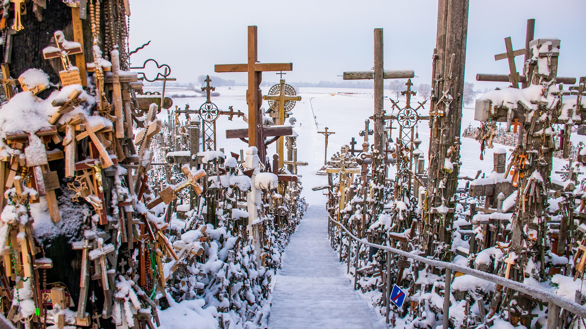 hill-of-crosses-lithuania-winter-snow-swiper-hero-gallery