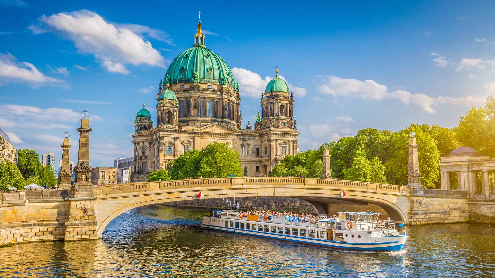 Beautiful view of historic Berlin Cathedral Berliner Dom at famous Museumsinsel Museum Island with excursion boat on Spr