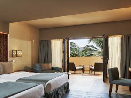 fanar-hotel-and-residences-hawana-salalah-oman-handicapped-bedroom-deluxe-room