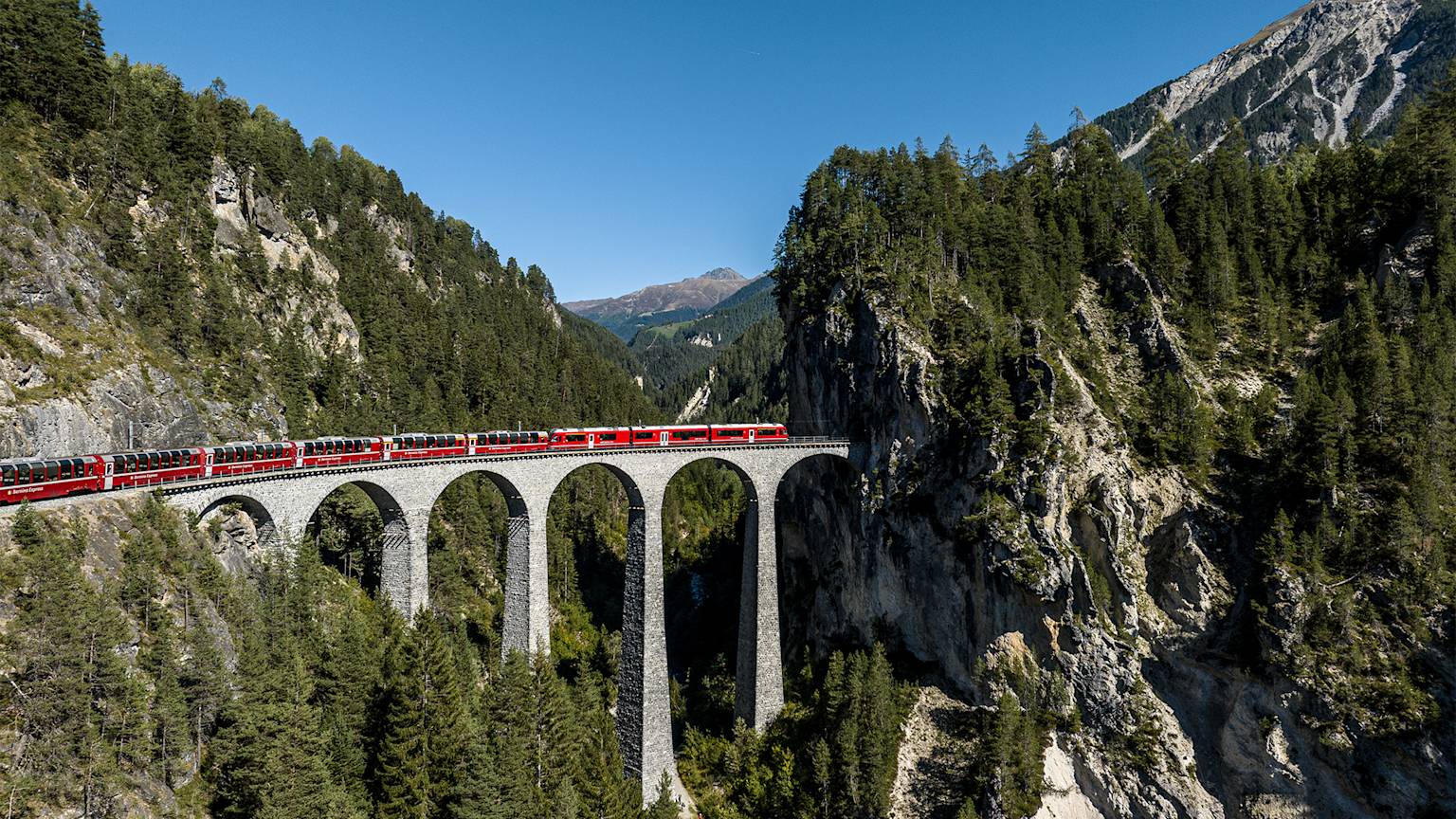 bernina-express-train-on-landwasserviadukt-switzerland-swiper-hero-gallery