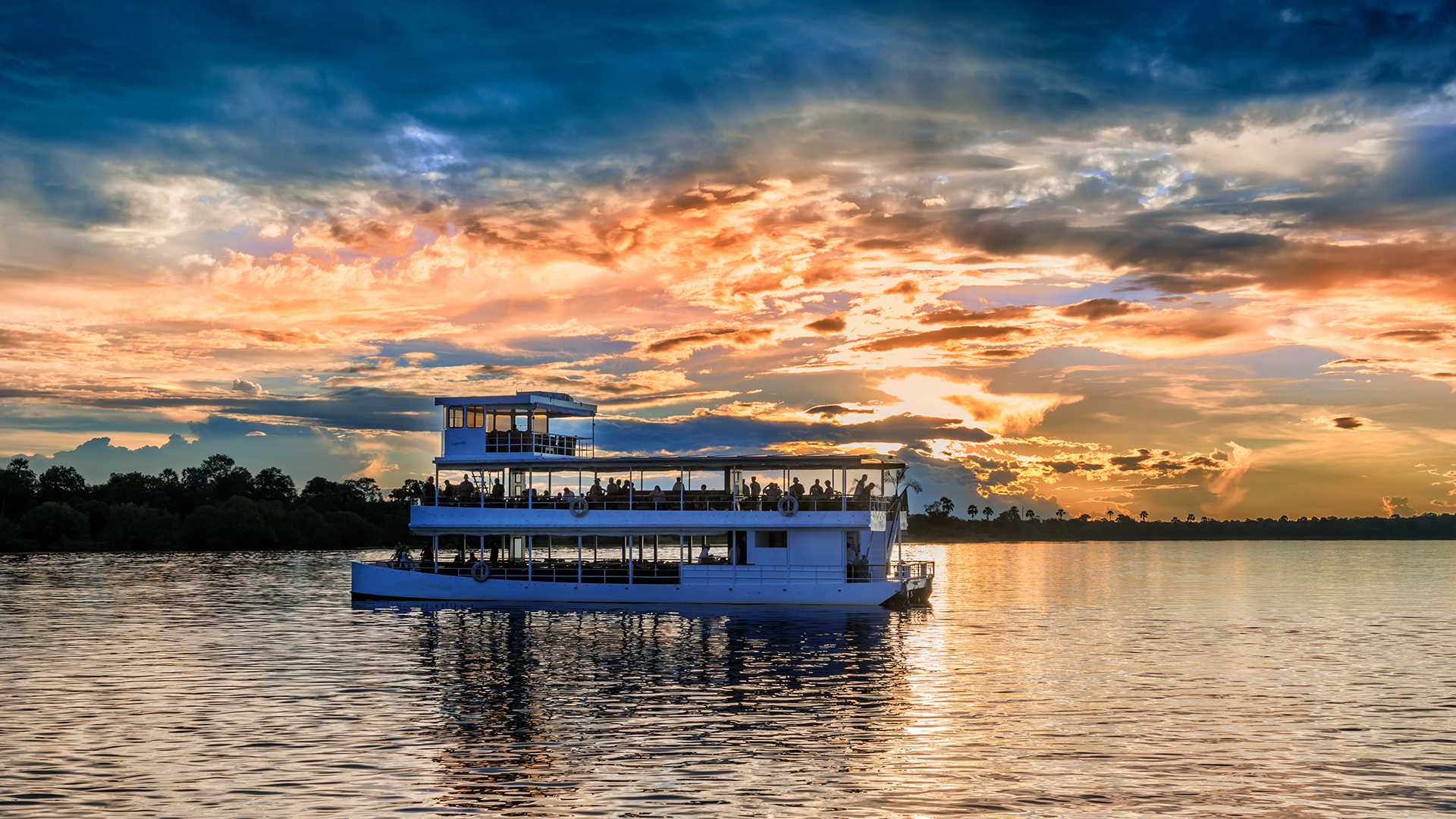Cruise the Zambezi River at sunset