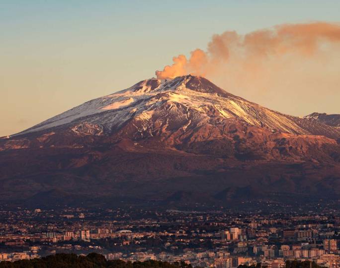 he-mount-Etna-Volcano-with-smoke-and-the-Catania-city-Sicily-island-Italy-Sicilia-Italia