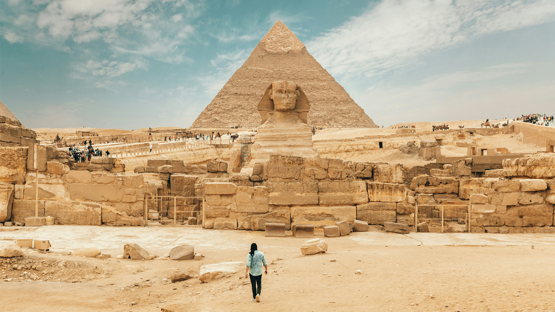 Visit the Pyramids of Giza and the Sphinx