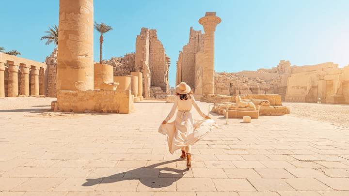 woman-exploring-karnak-temple-luxor-egypt-swiper-hero-gallery