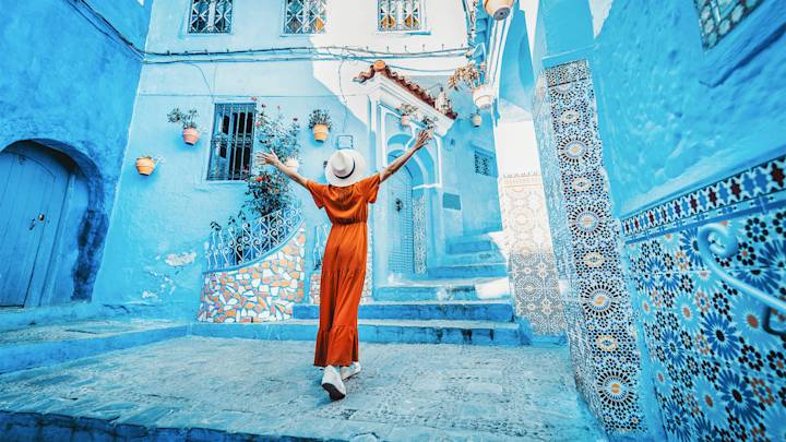 chefchaouen-morocco-blue-city-girl-swiper-hero-image