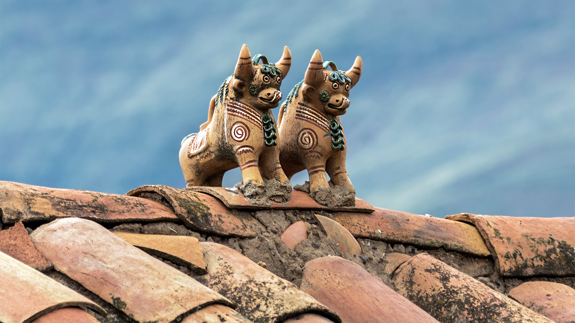 ritual-figurines-bulls-raqchi-peru-swiper-hero-gallery