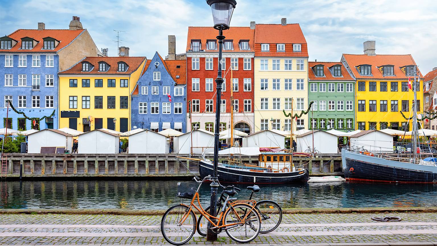 nyhavn-area-copenhagen-denmark-boats-bikes-swiper-hero-gallery