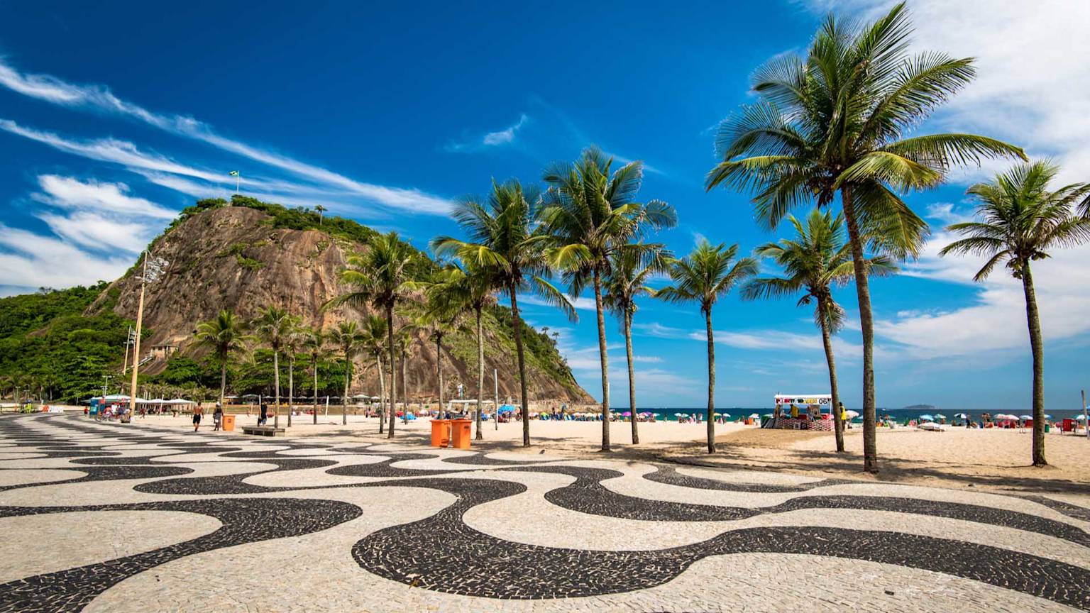 famous-mosaic-of-sidewalk-and-palm-trees-in-leme-and-copacabana-beach-in-rio-de-janeiro-brazil