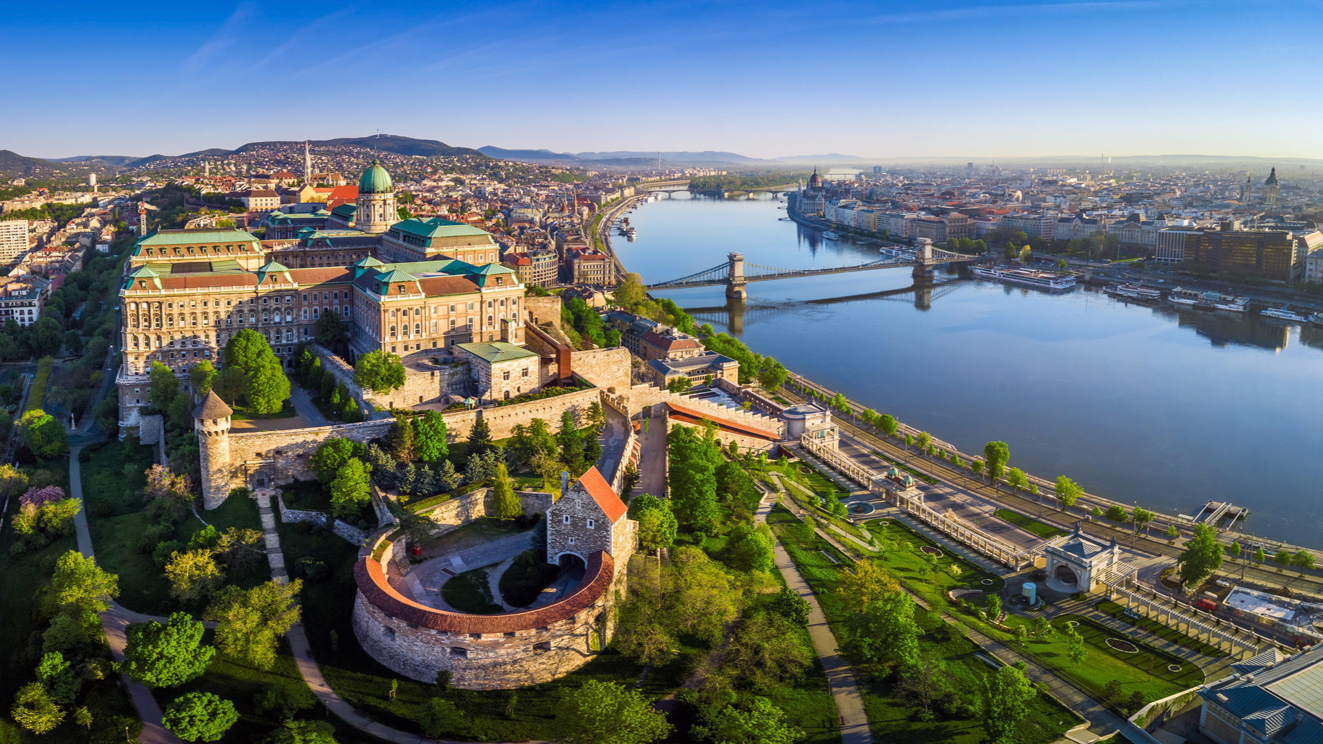 Budapest-Hungary-Aerial-panoramic-skyline-view-of-Buda-Castle-Royal-Palace-with-Szechenyi-Chain-Bridge-St.Stephen-s-Basilica