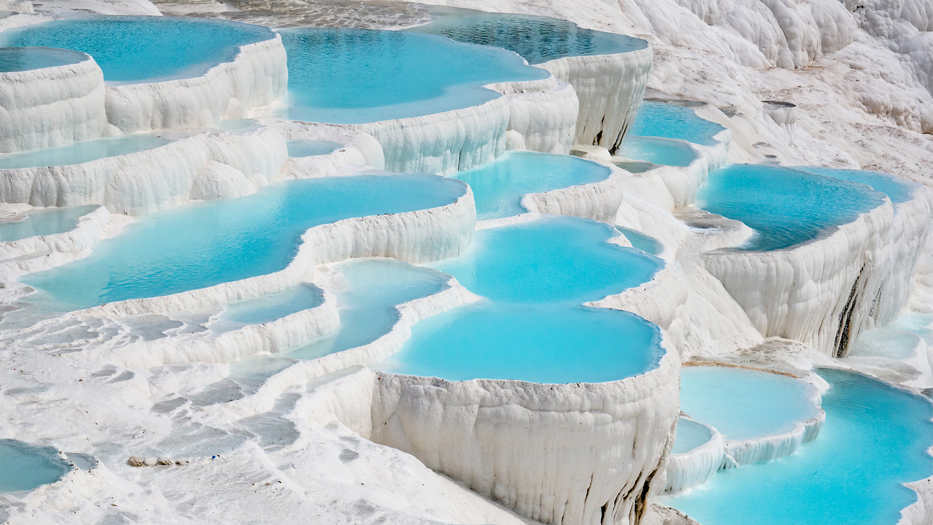 Admire Pamukkale’s white calcium terraces