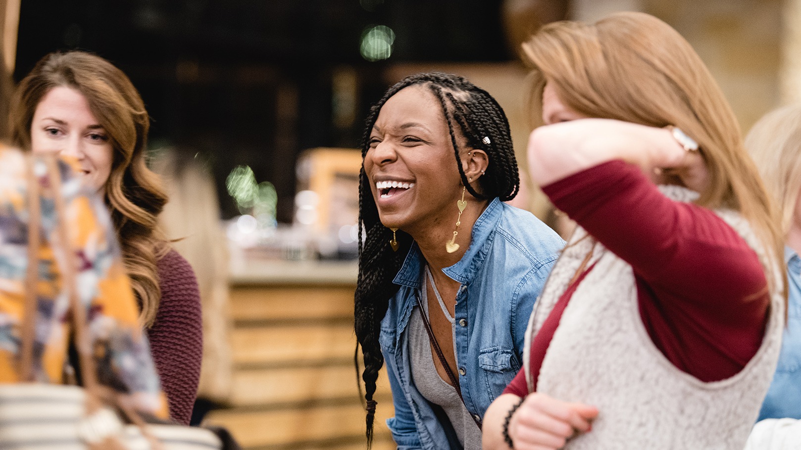 Group of women laughing together.