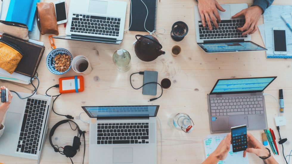 Laptops open on work table