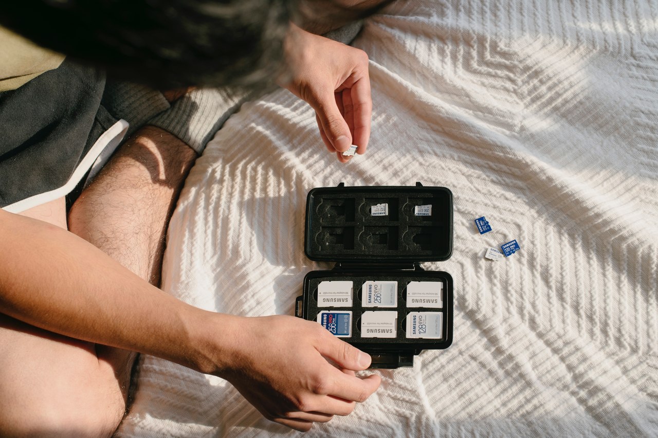 memory card holder and someone sitting