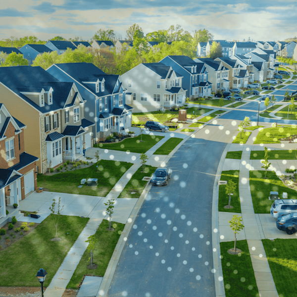 A tech themed overlay on an aerial view of a residential neighborhood