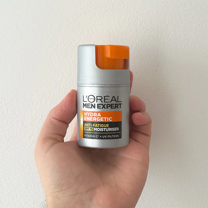 Hand holding a L'Oréal Men Expert SPF moisturiser