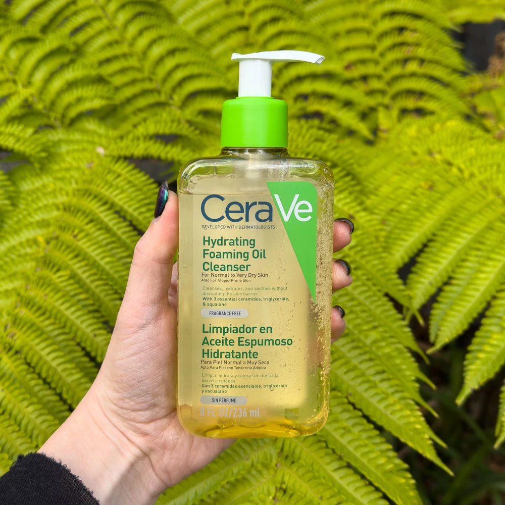 CeraVe Hydrating Foaming Oil Cleanser in-front of leaves