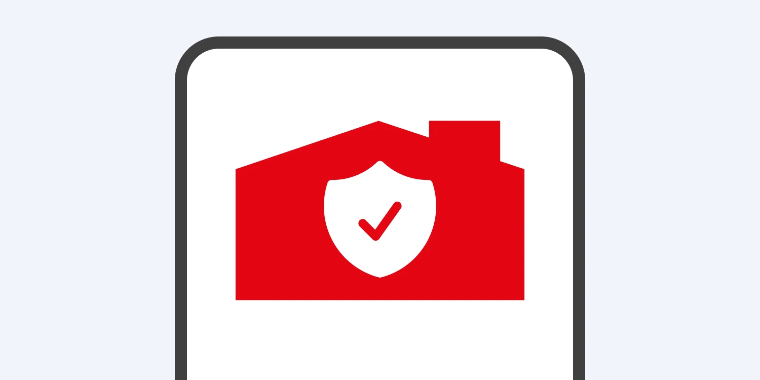 Red warehouse silhouette with white security shield icon containing a checkmark, indicating home protection or safety