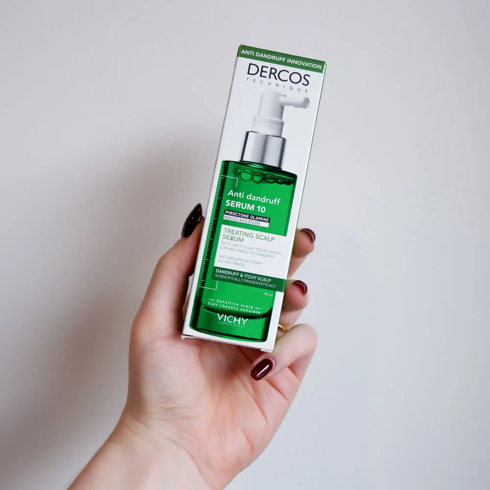 Hand holding Dercos Anti dandruff Serum 10